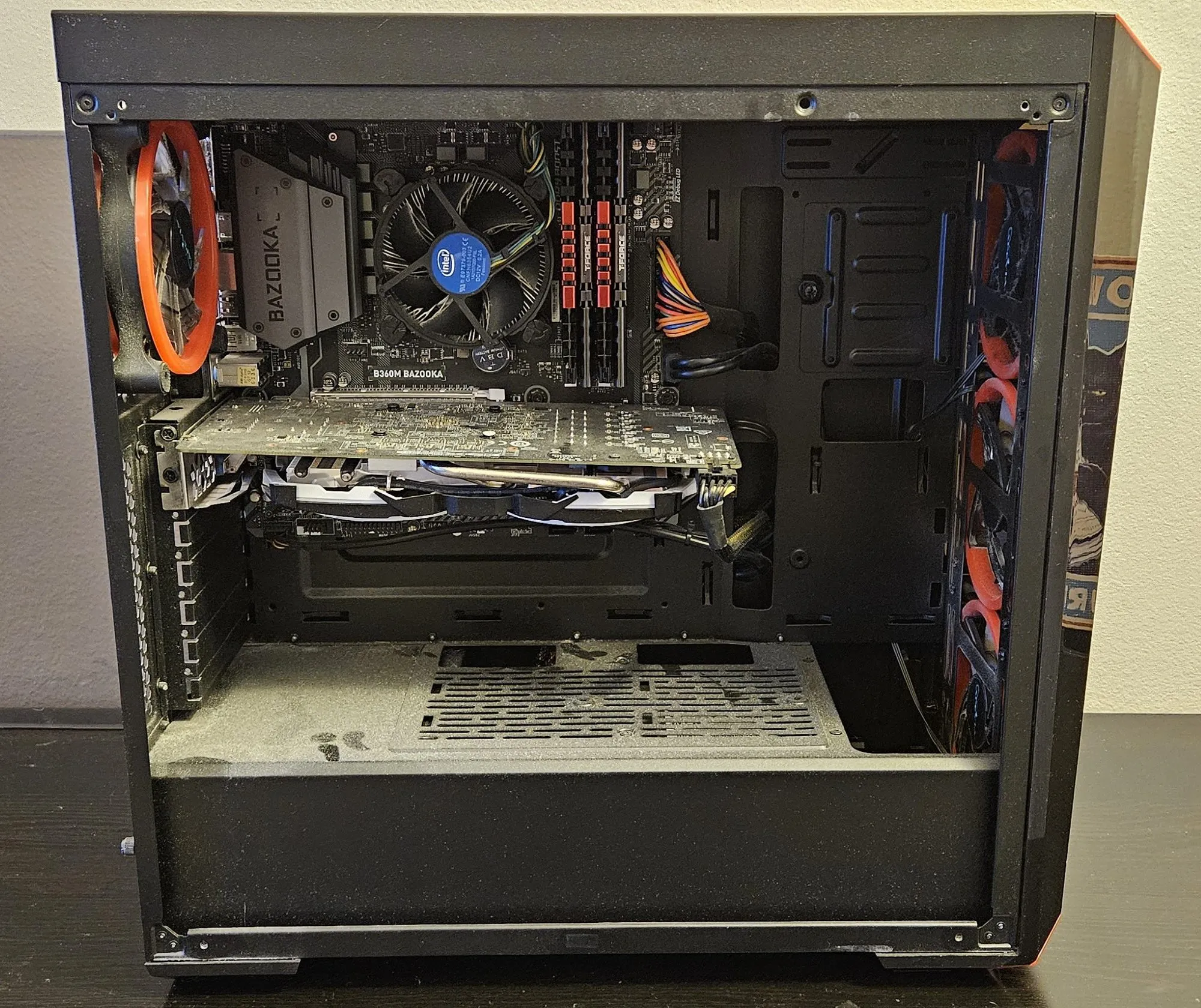 The original CyberPowerPC case opened up, with the Intel i5 and stock cooler